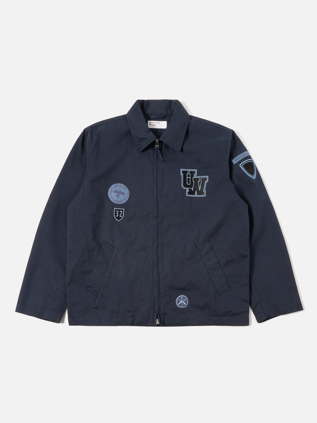 Universal Works Drizzler Jacket in Navy Twill/Badges