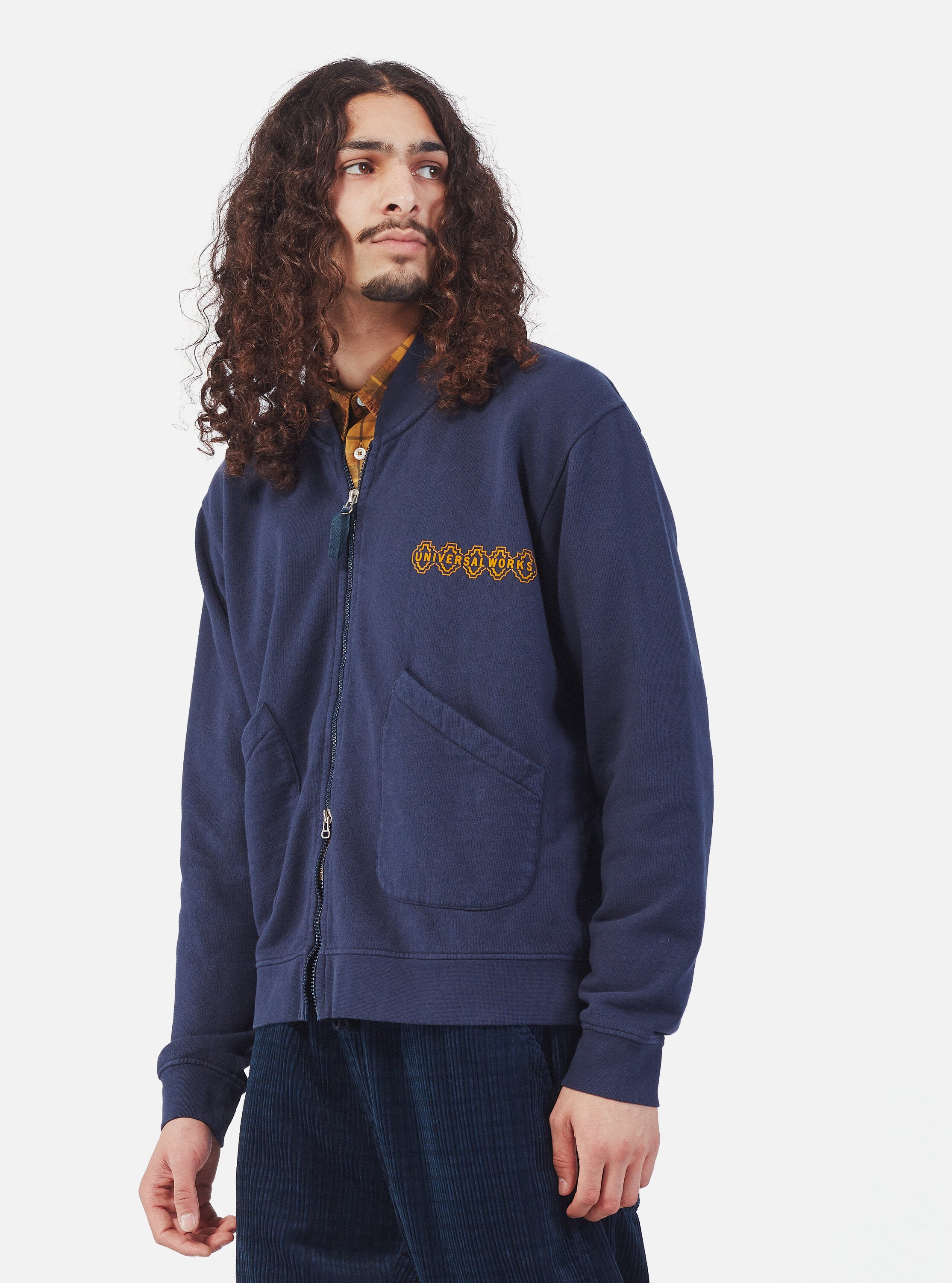 Universal Works Oxford Bomber Jacket in Navy Dry Handle Brushback