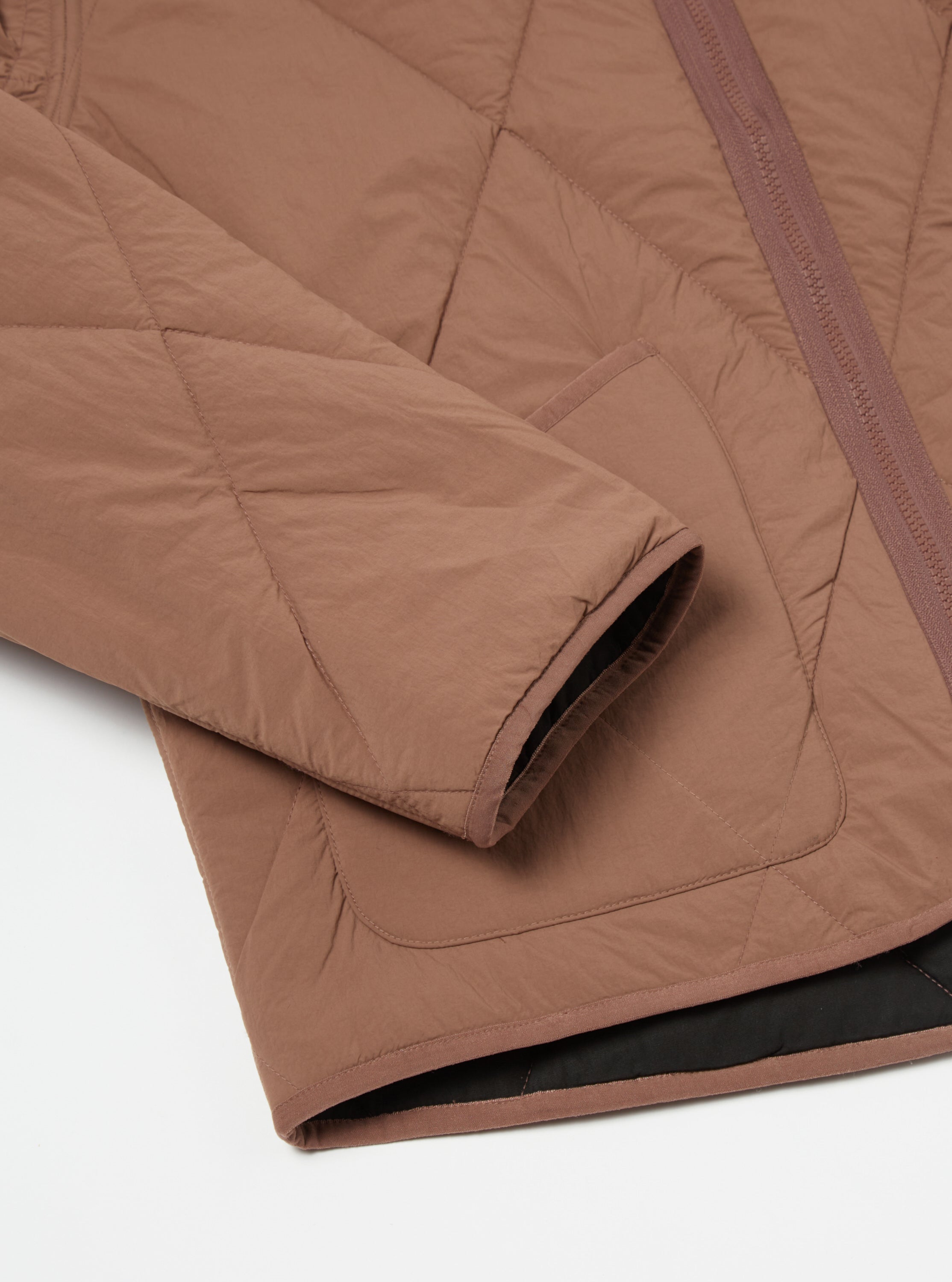 Universal Works Reversible Military Liner Jacket in Brown/Black Diamond Quilt Recycled Nylon