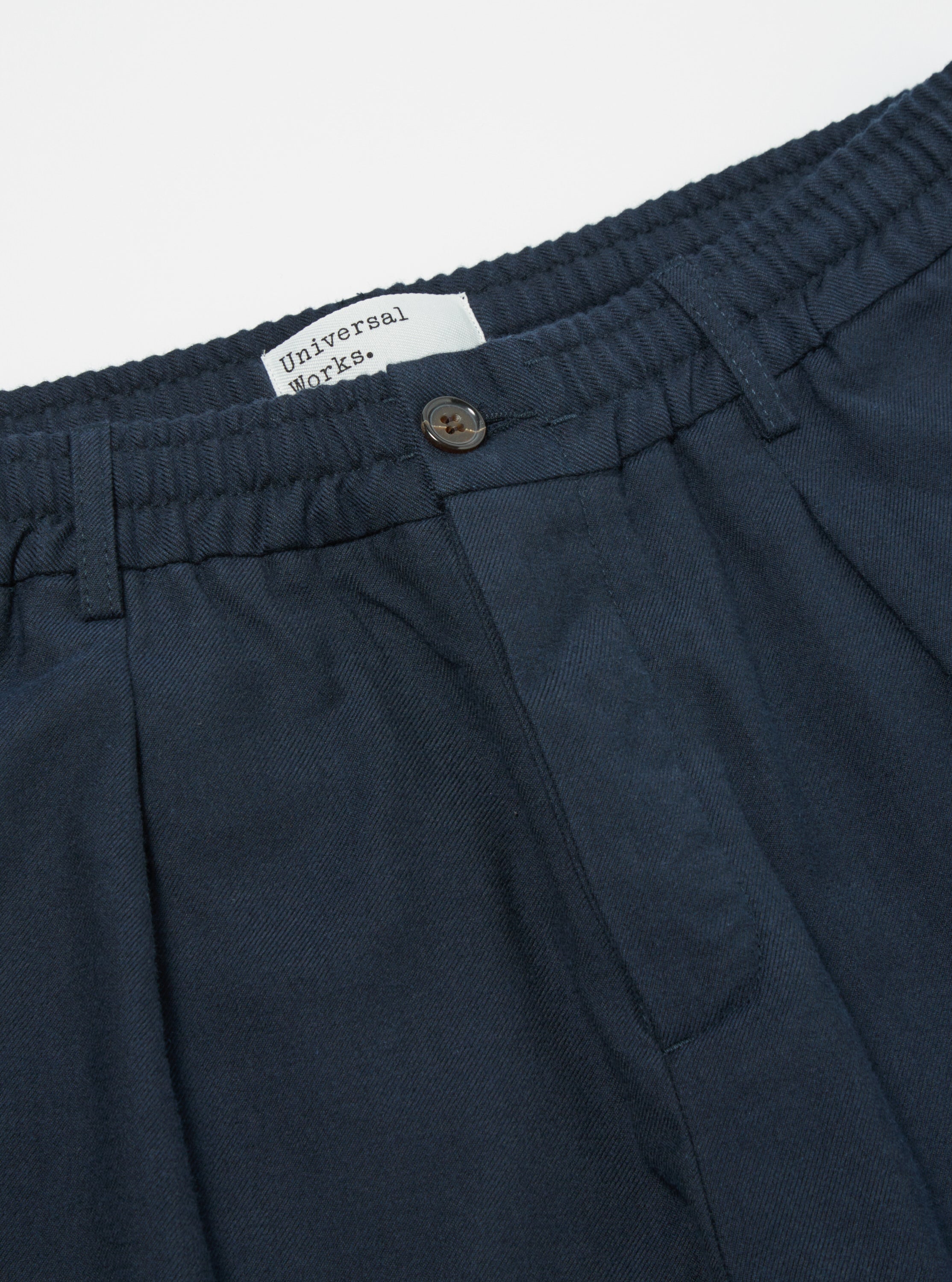 Universal Works Pleated Track Pant in Navy Cotton/Wool Twill