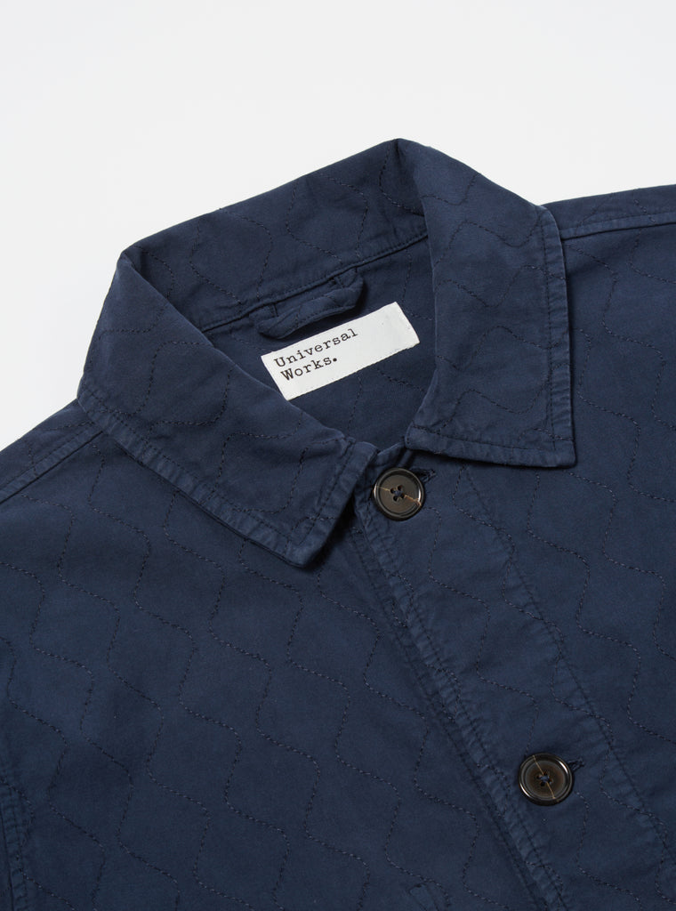 Universal Works Quilted Coverall Jacket in Navy Cotton