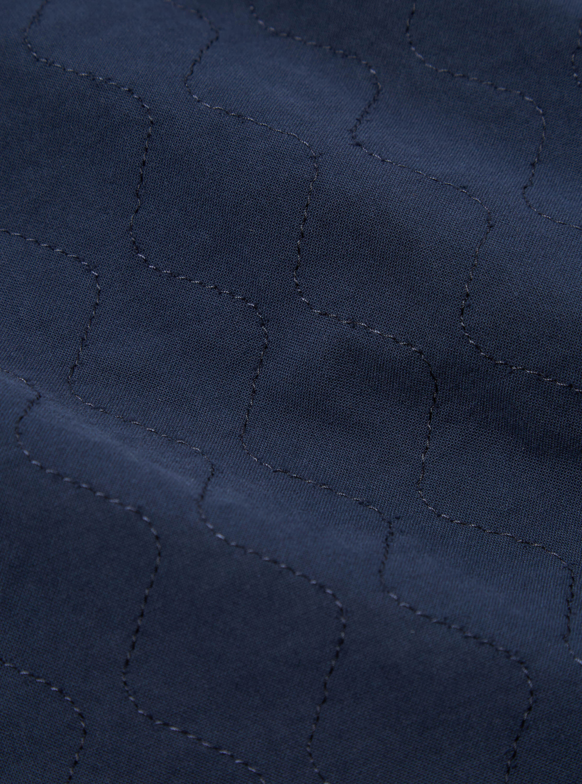 Universal Works Quilted Coverall Jacket in Navy Cotton