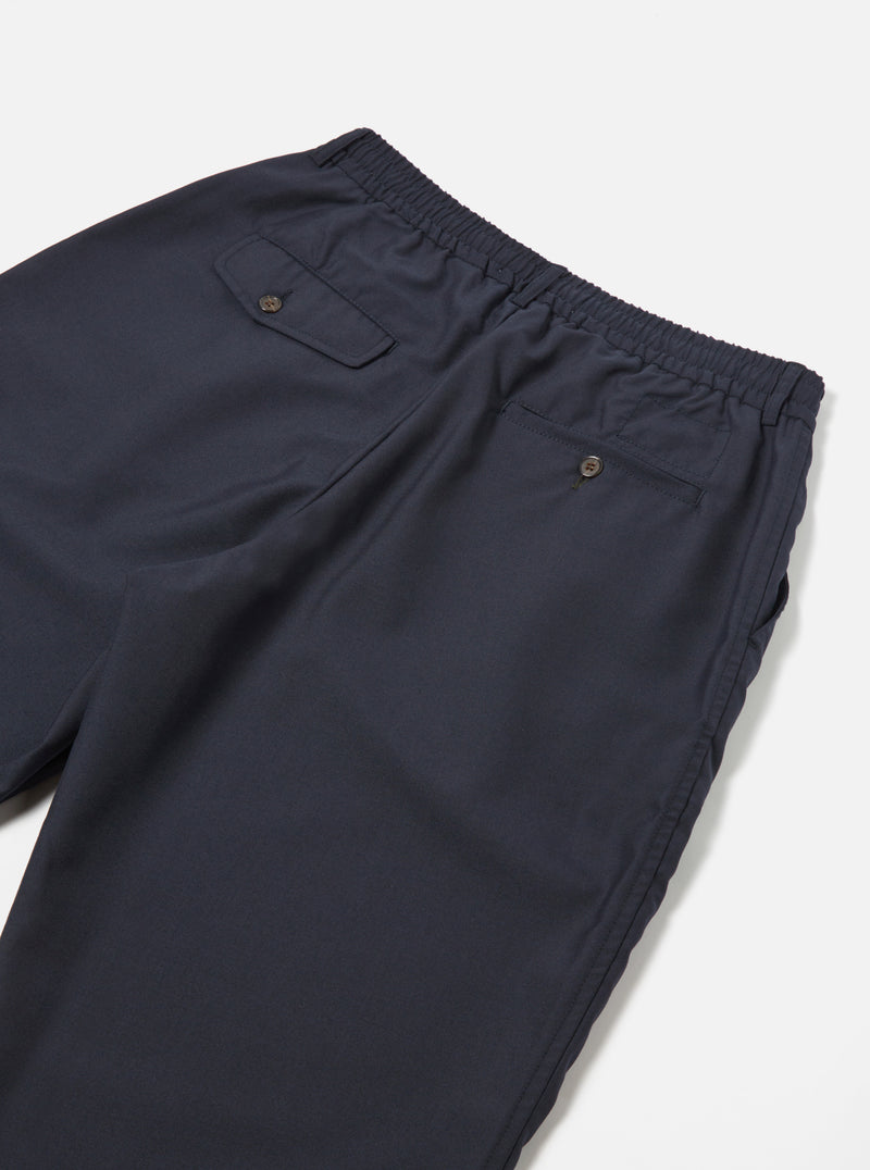 Universal Works Pleated Track Pant in Navy Tropical Suiting