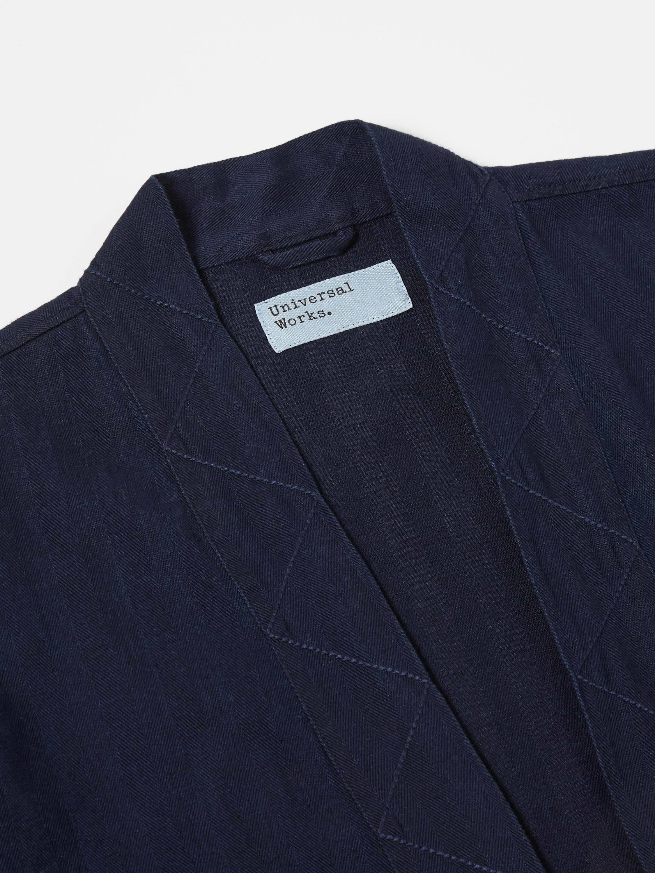 Universal Works Tie Front Jacket in Indigo Herringbone Denim