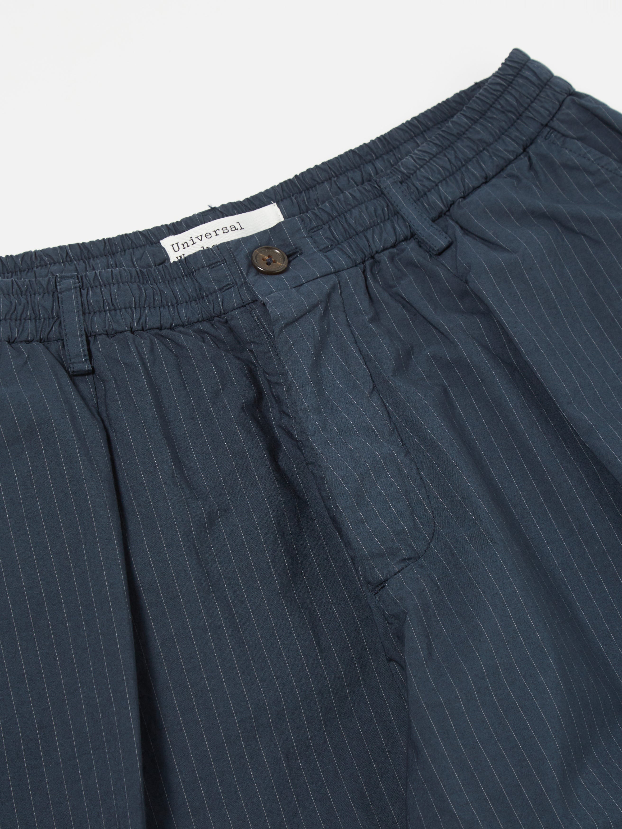 Universal Works Pleated Track Pant in Navy Nearly Pinstripe