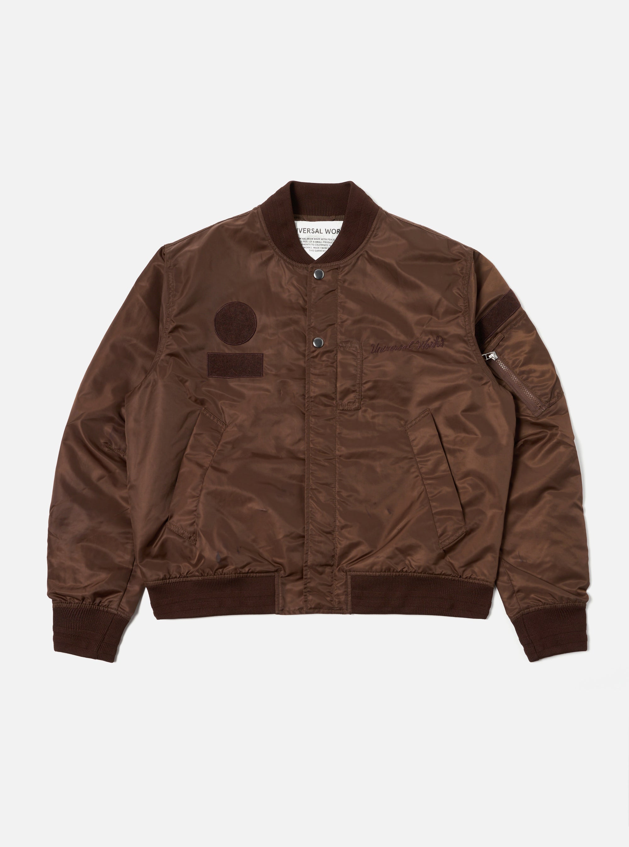 Universal Works Badge Bomber in Brown Flight Nylon