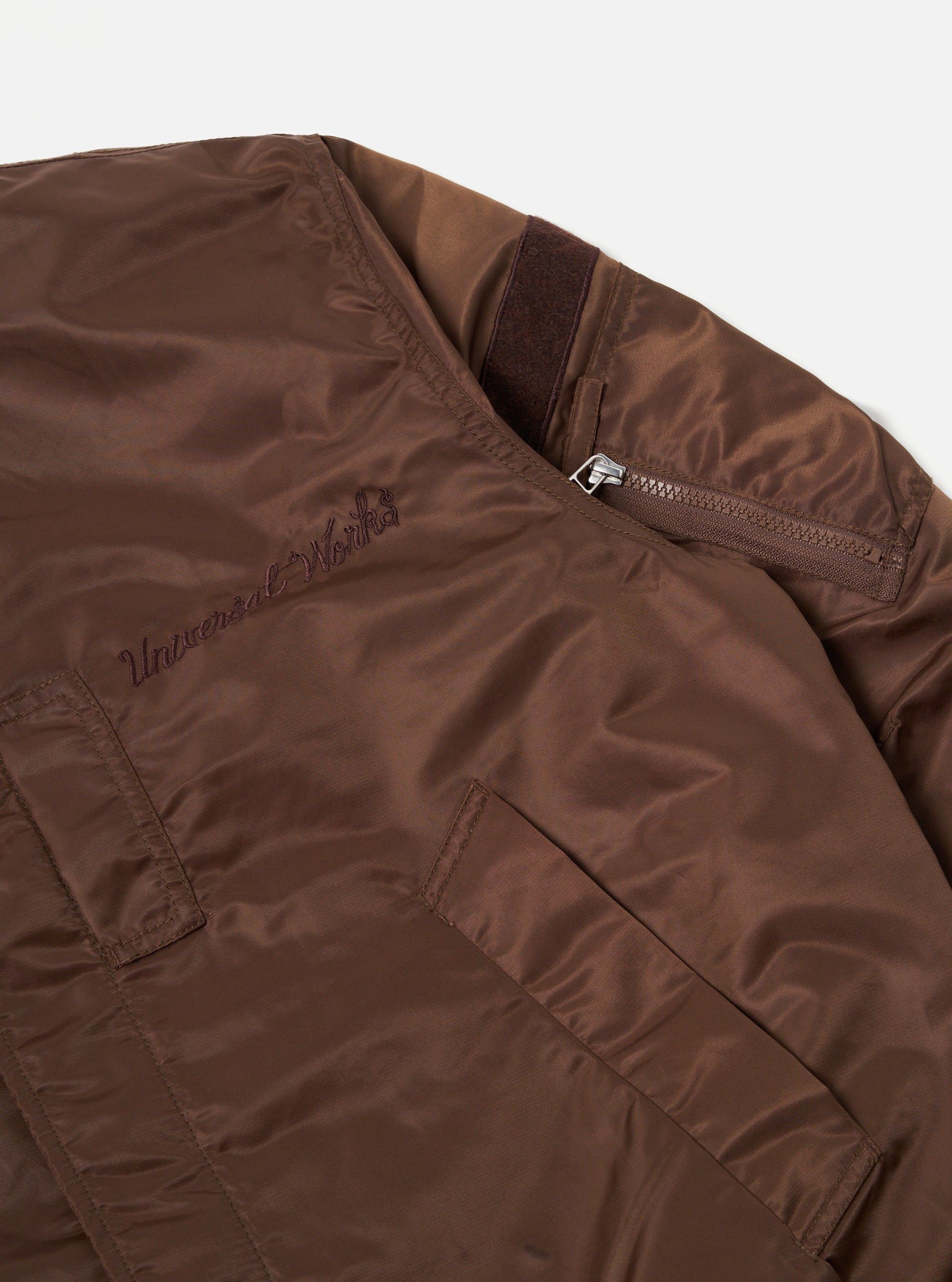 Universal Works Badge Bomber in Brown Flight Nylon