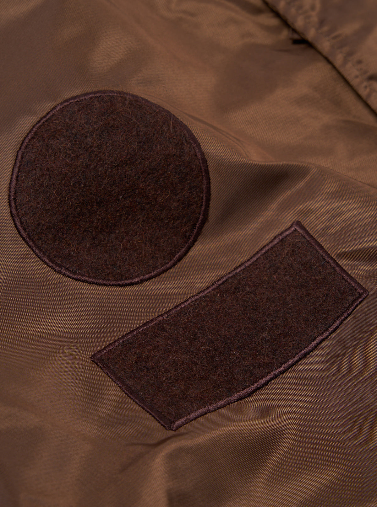 Universal Works Badge Bomber in Brown Flight Nylon