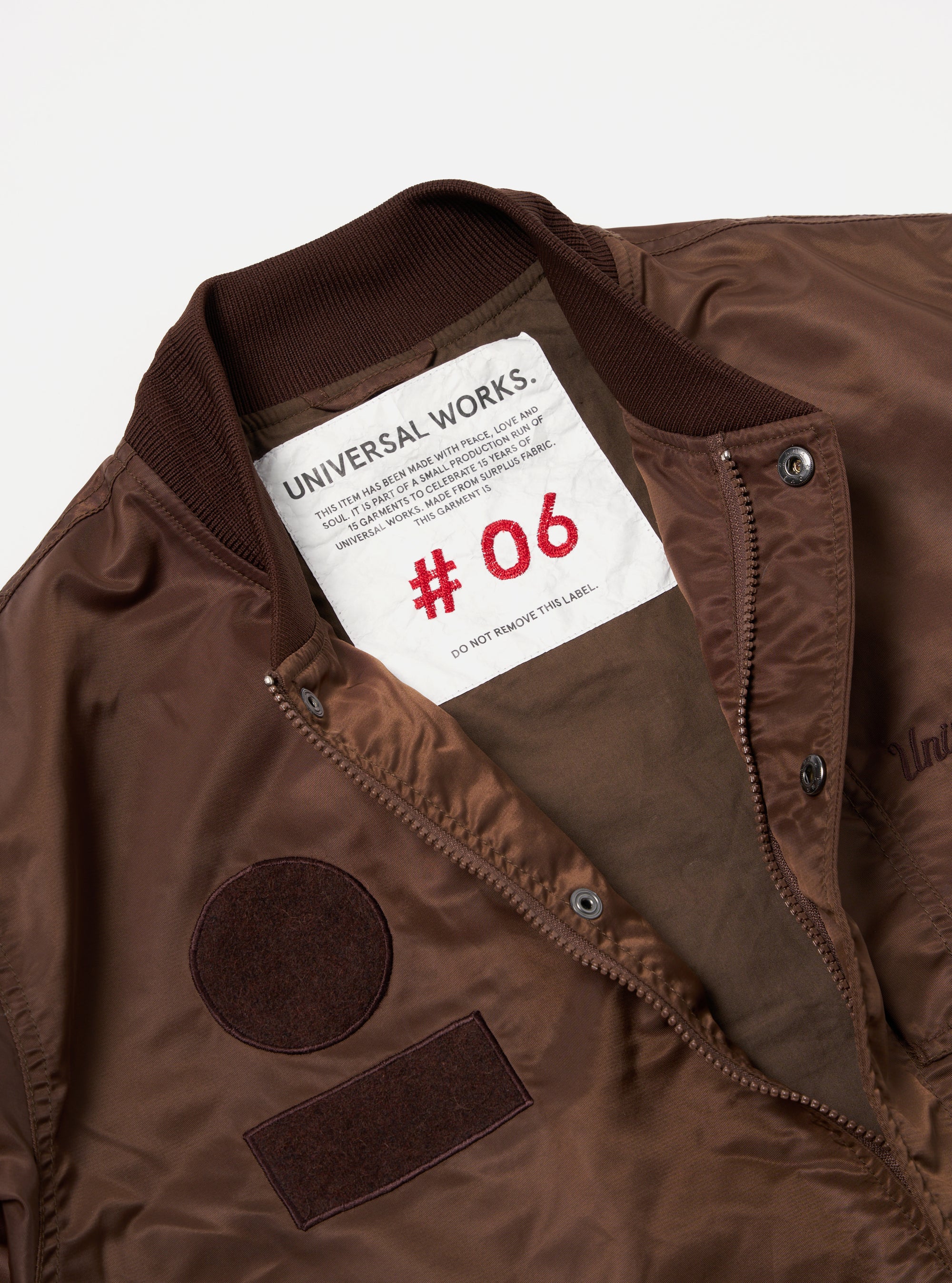 Universal Works Badge Bomber in Brown Flight Nylon