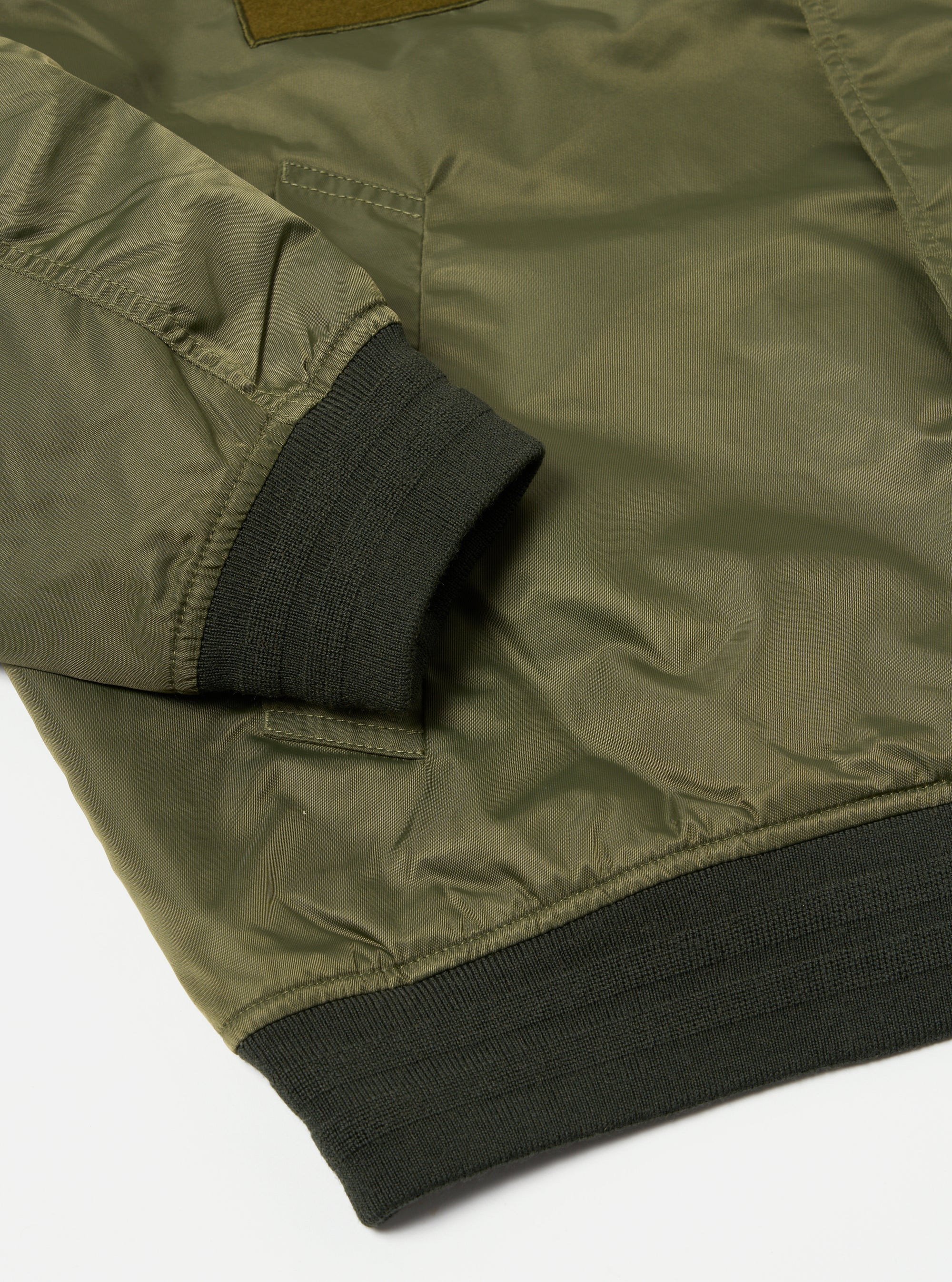 Universal Works Badge Bomber in Olive Flight Nylon