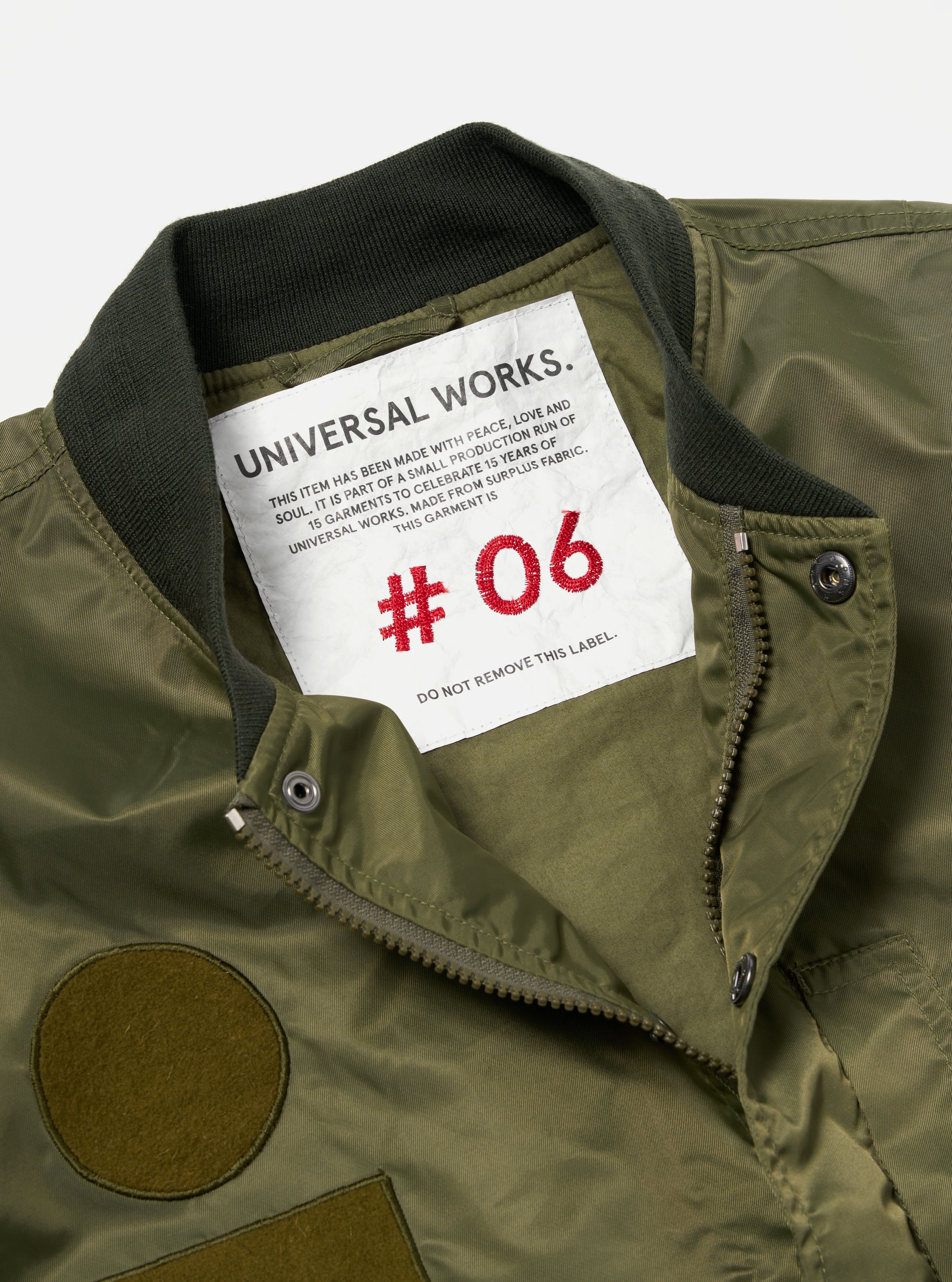 Universal Works Badge Bomber in Olive Flight Nylon