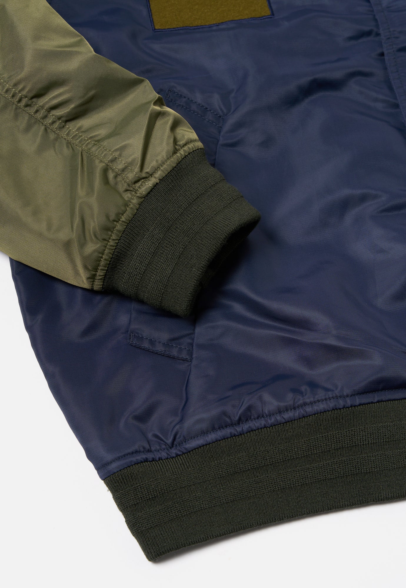 Universal Works Badge Bomber in Olive/Navy Flight Nylon