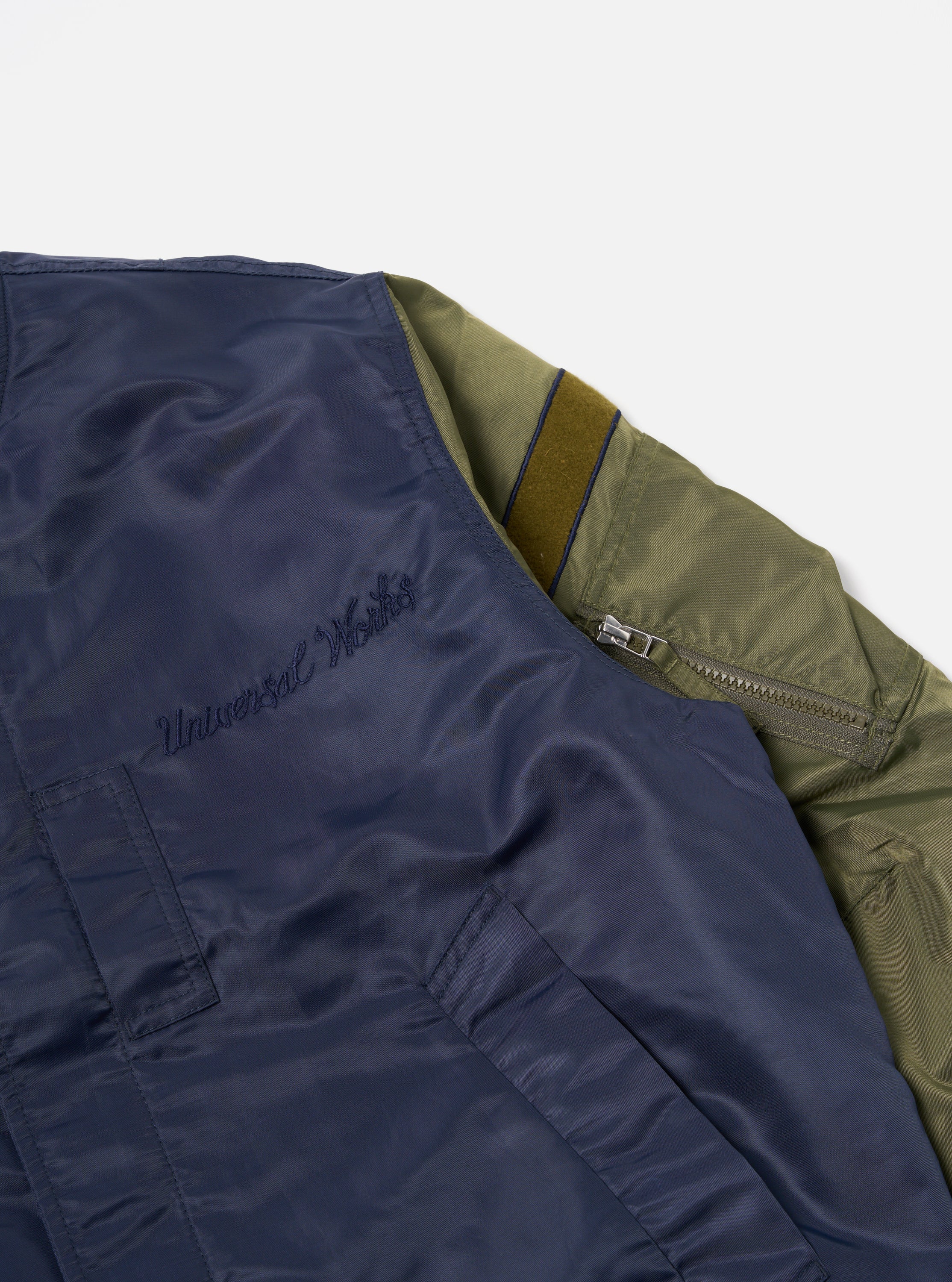 Universal Works Badge Bomber in Olive/Navy Flight Nylon