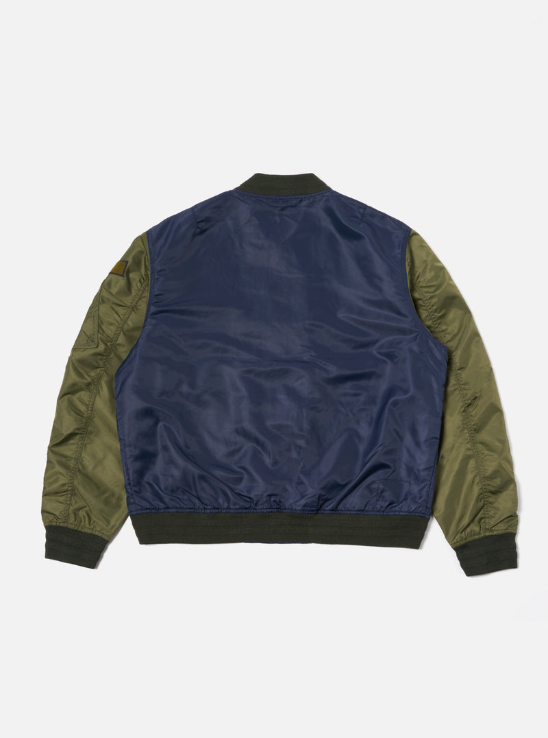 Universal Works Badge Bomber in Olive/Navy Flight Nylon