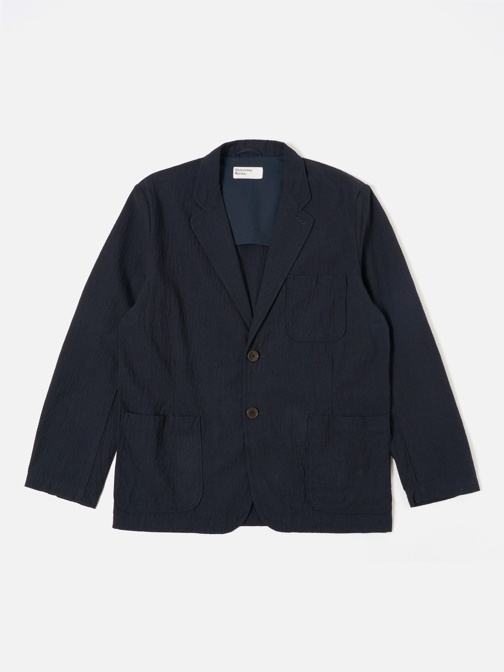 Universal Works Two Button Jacket in Dark Navy Ospina Cotton