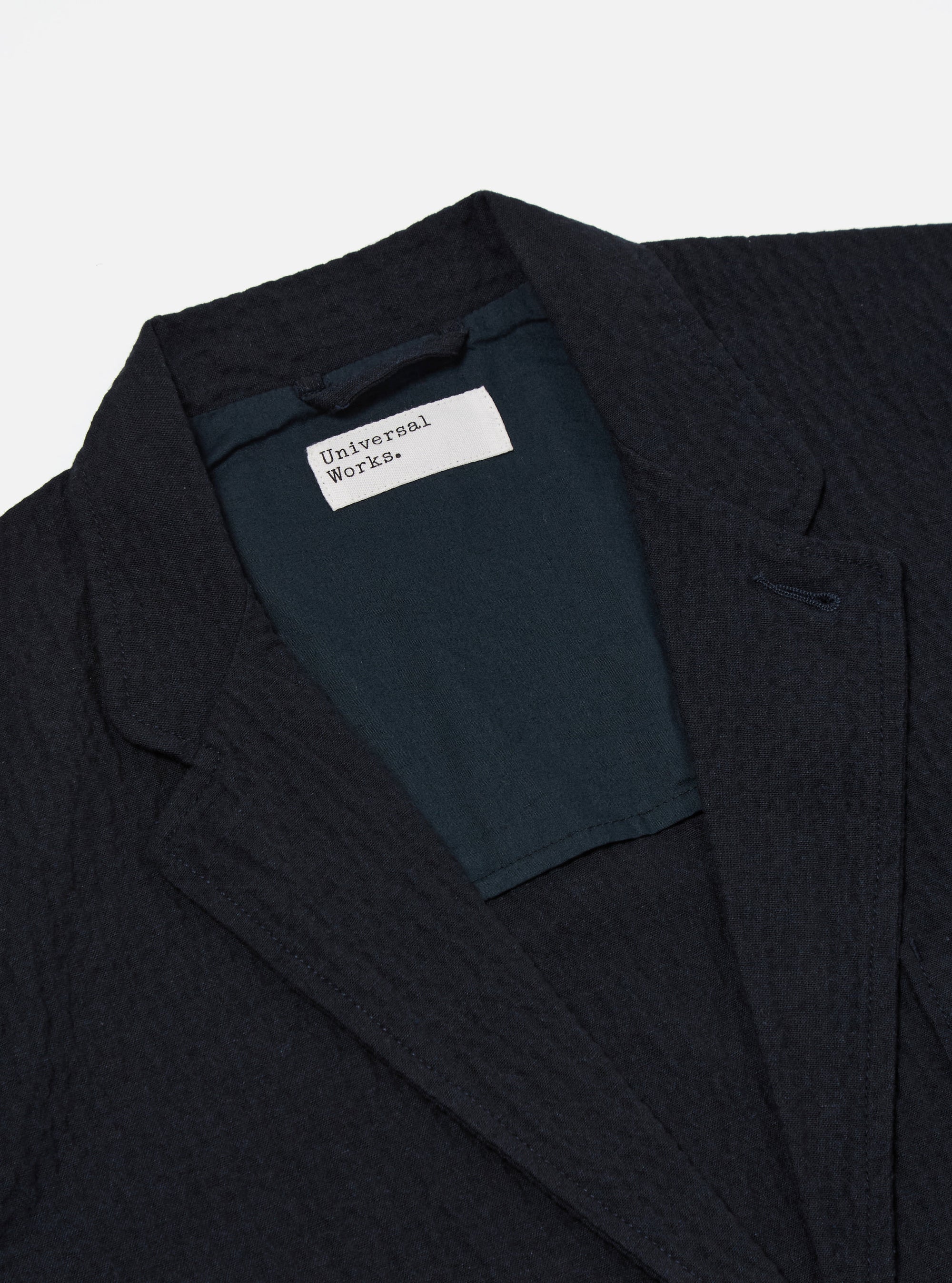 Universal Works Two Button Jacket in Dark Navy Ospina Cotton