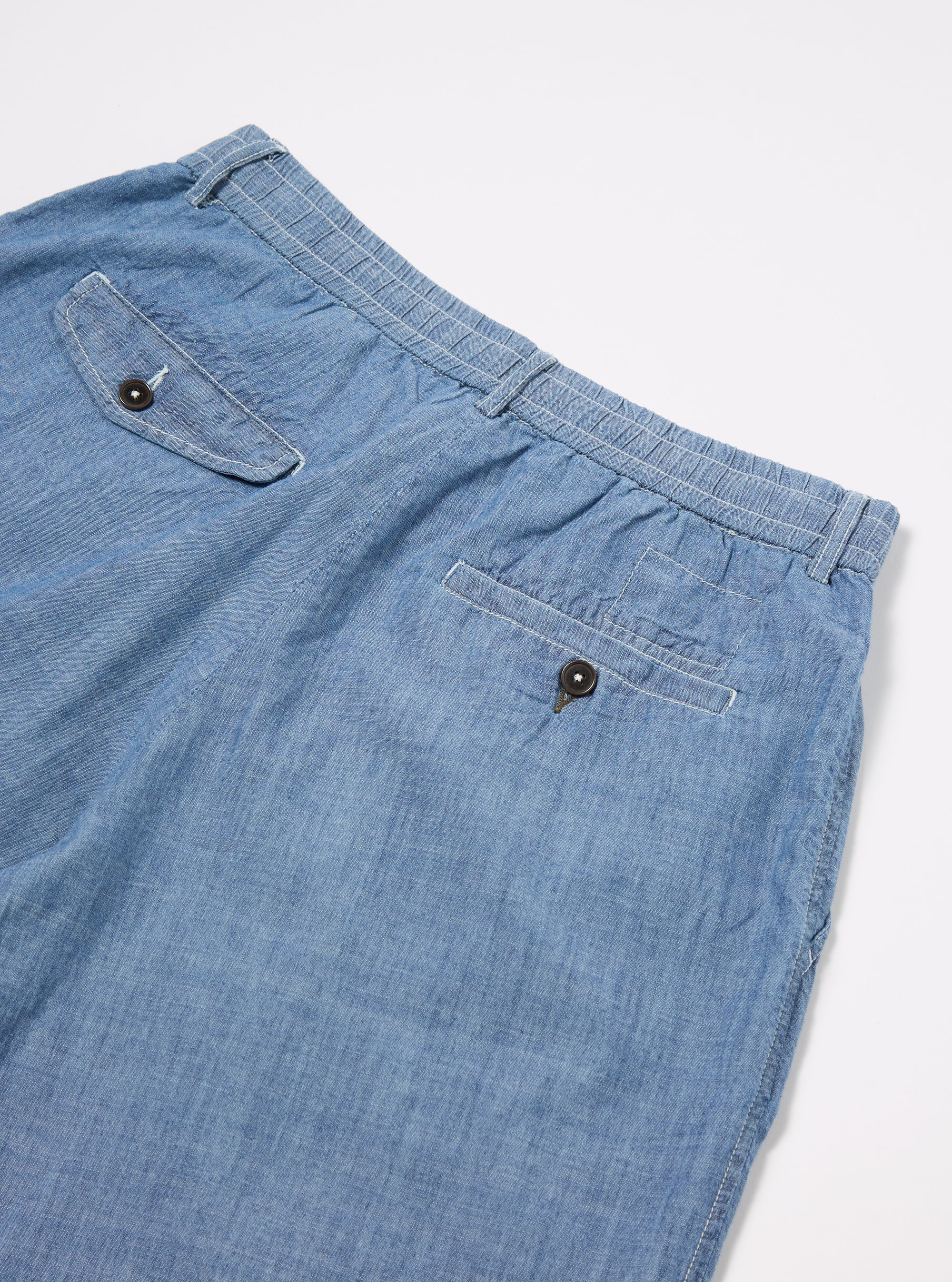 Universal Works Pleated Track Short in Washed Indigo Chambray