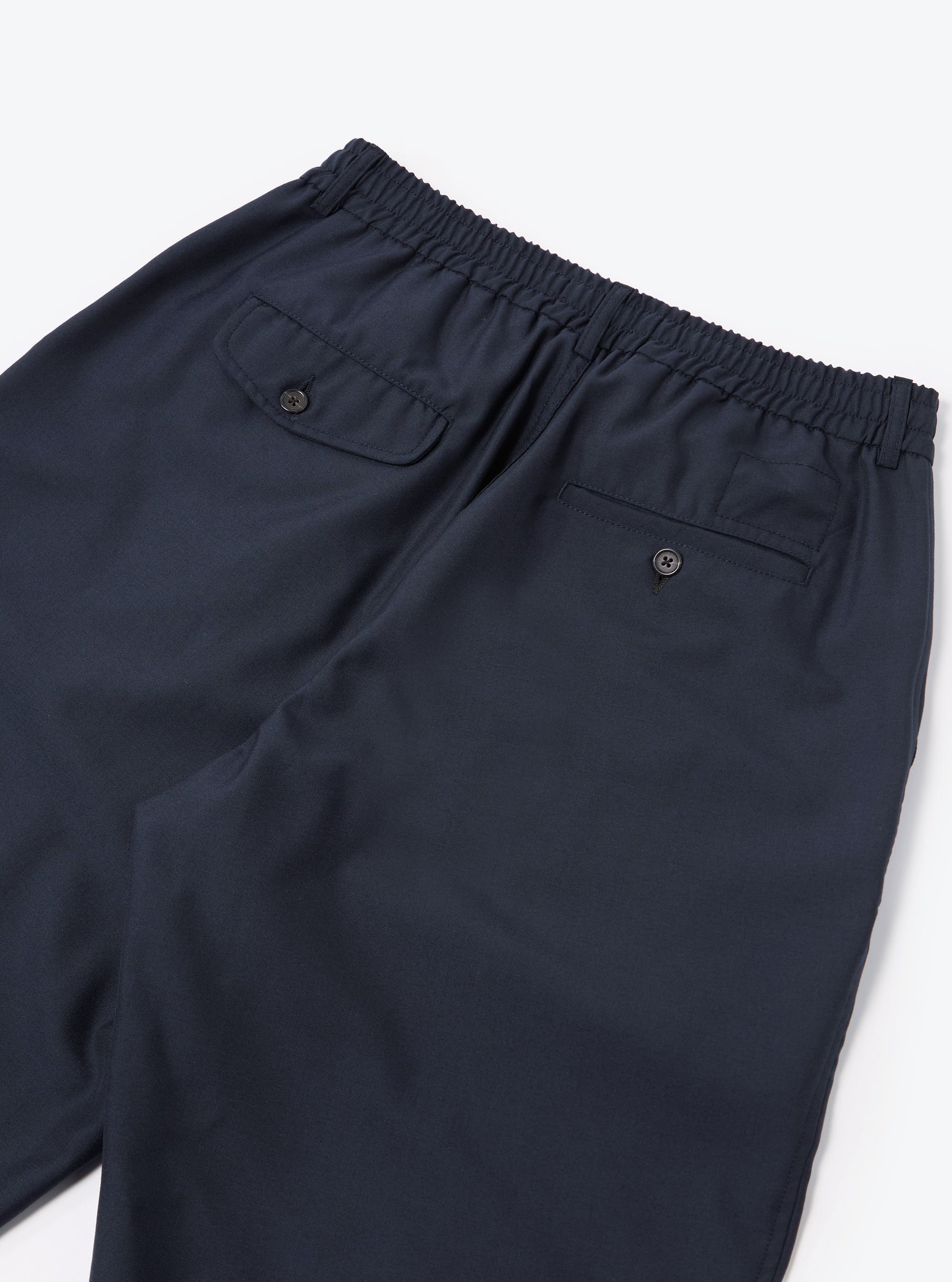 Universal Works Pleated Track Pant in Navy Tropical Suiting