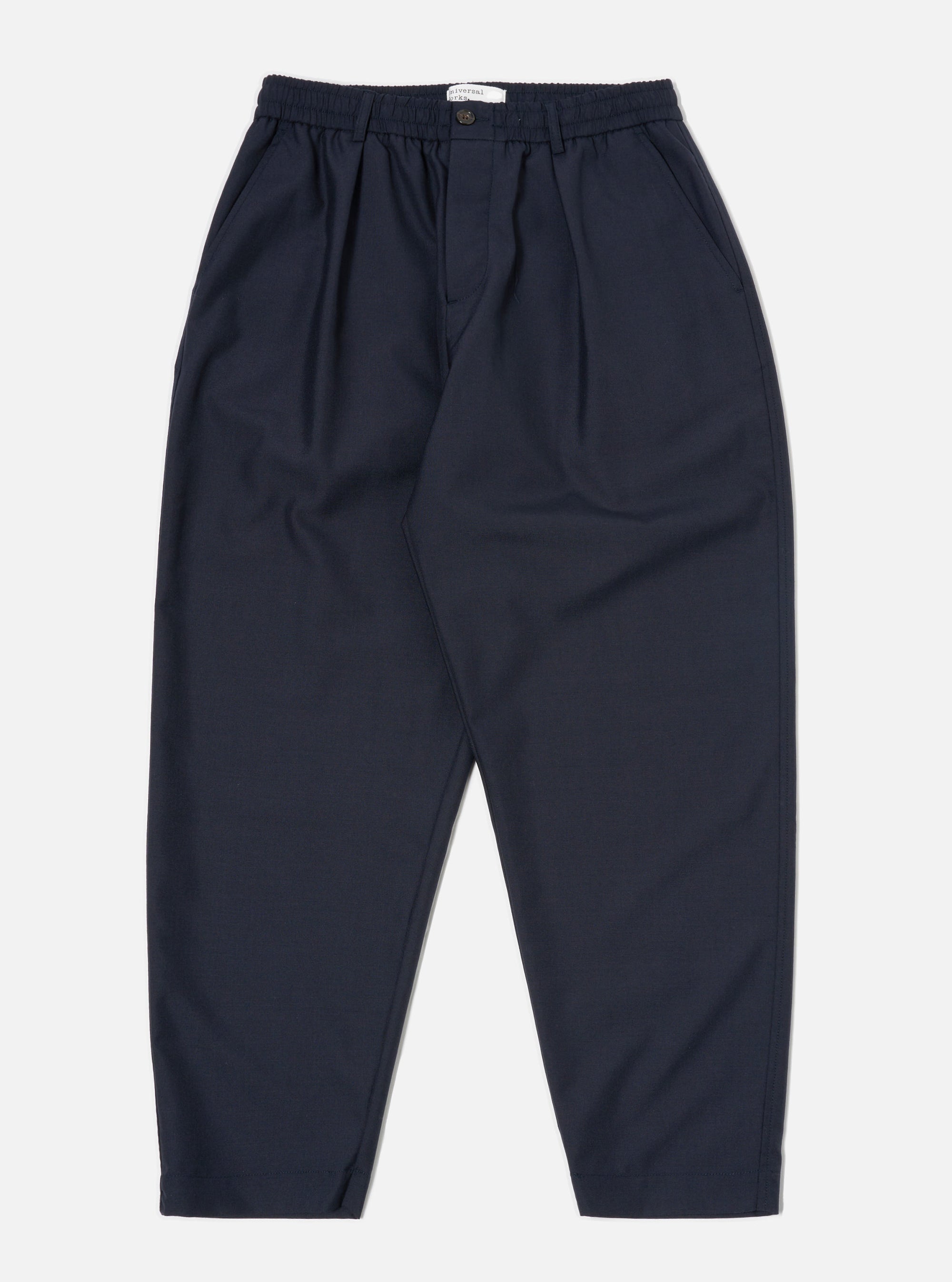 Universal Works Pleated Track Pant in Navy Tropical Suiting