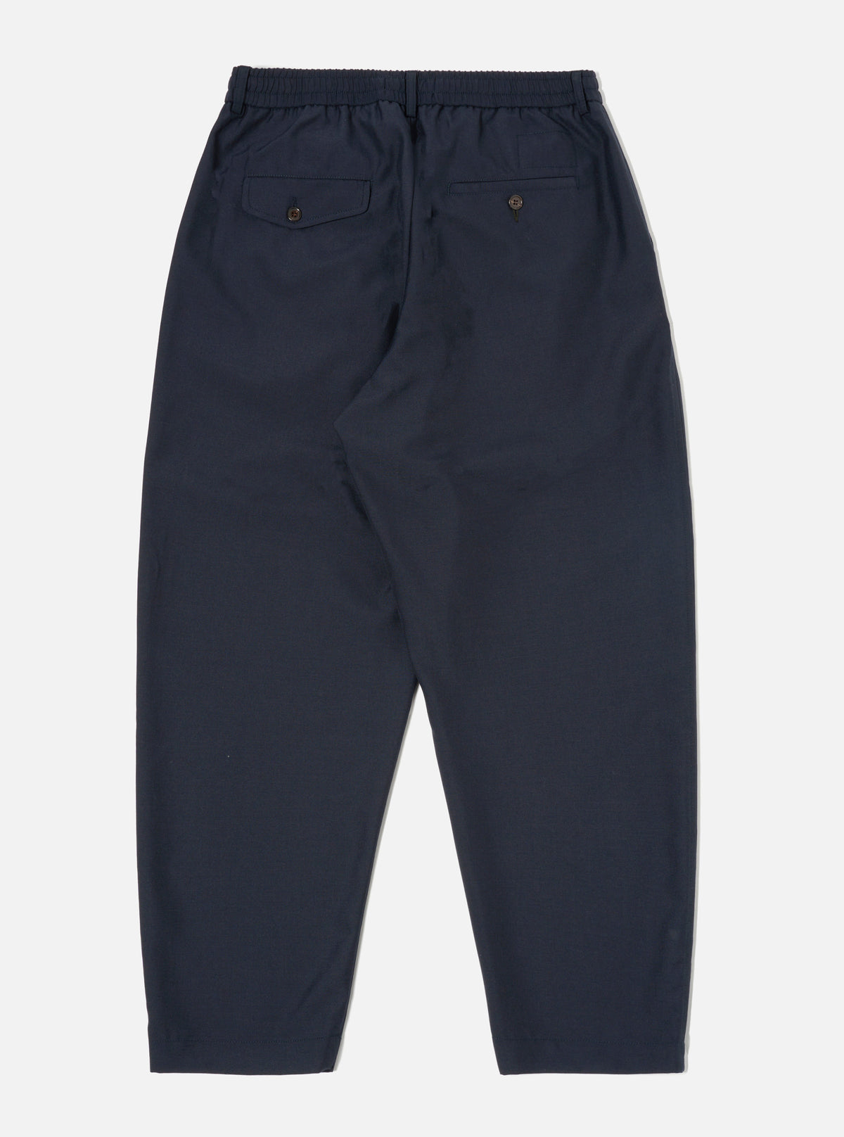 Universal Works Pleated Track Pant in Navy Tropical Suiting