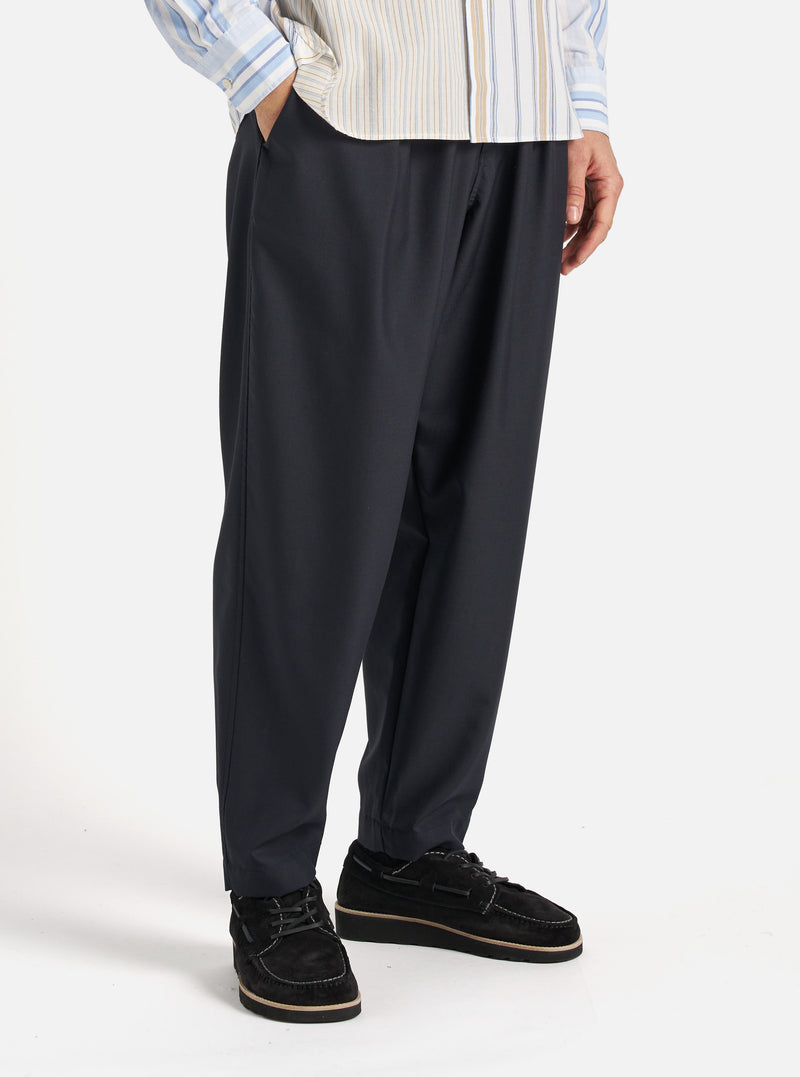 Universal Works Pleated Track Pant in Navy Tropical Suiting