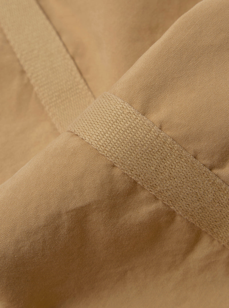 Universal Works Windcheater Jacket in Dark Sand Summer Canvas