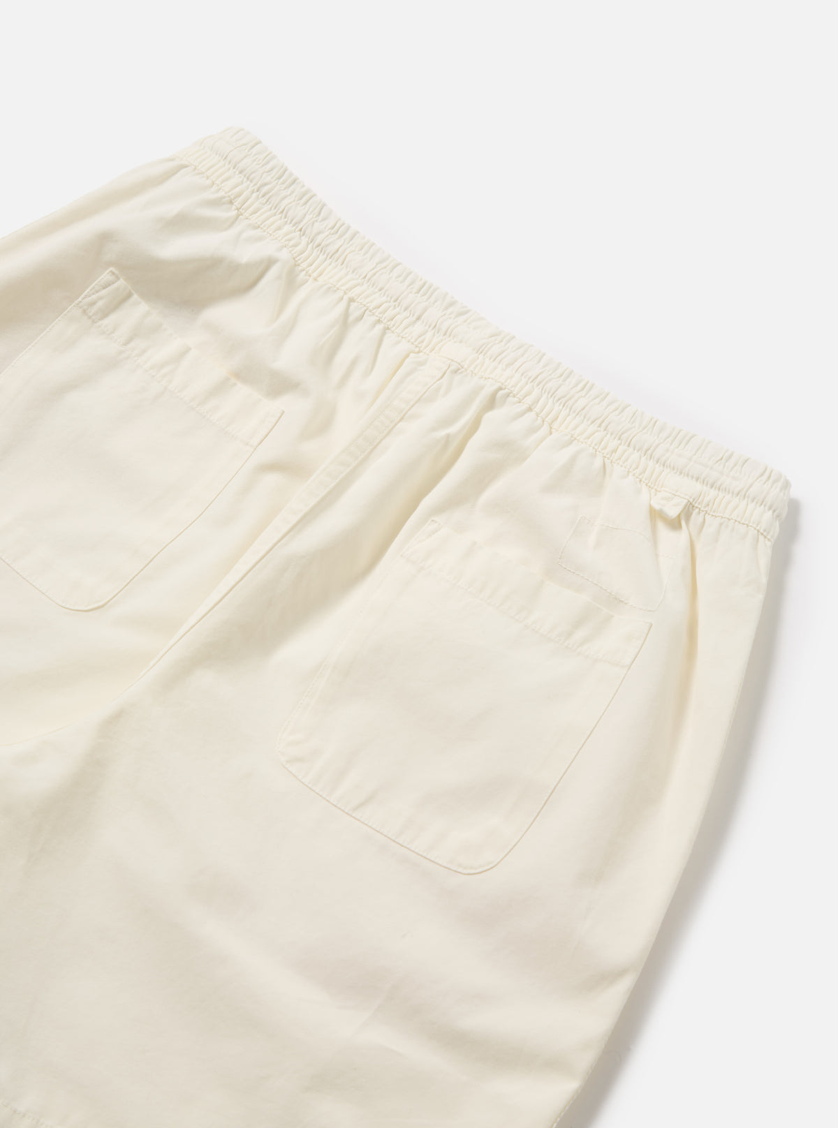 Universal Works Beach Short in Ecru Summer Canvas