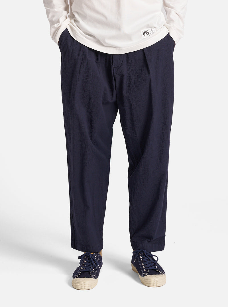Universal Works Pleated Track Pant in Navy Seersucker II