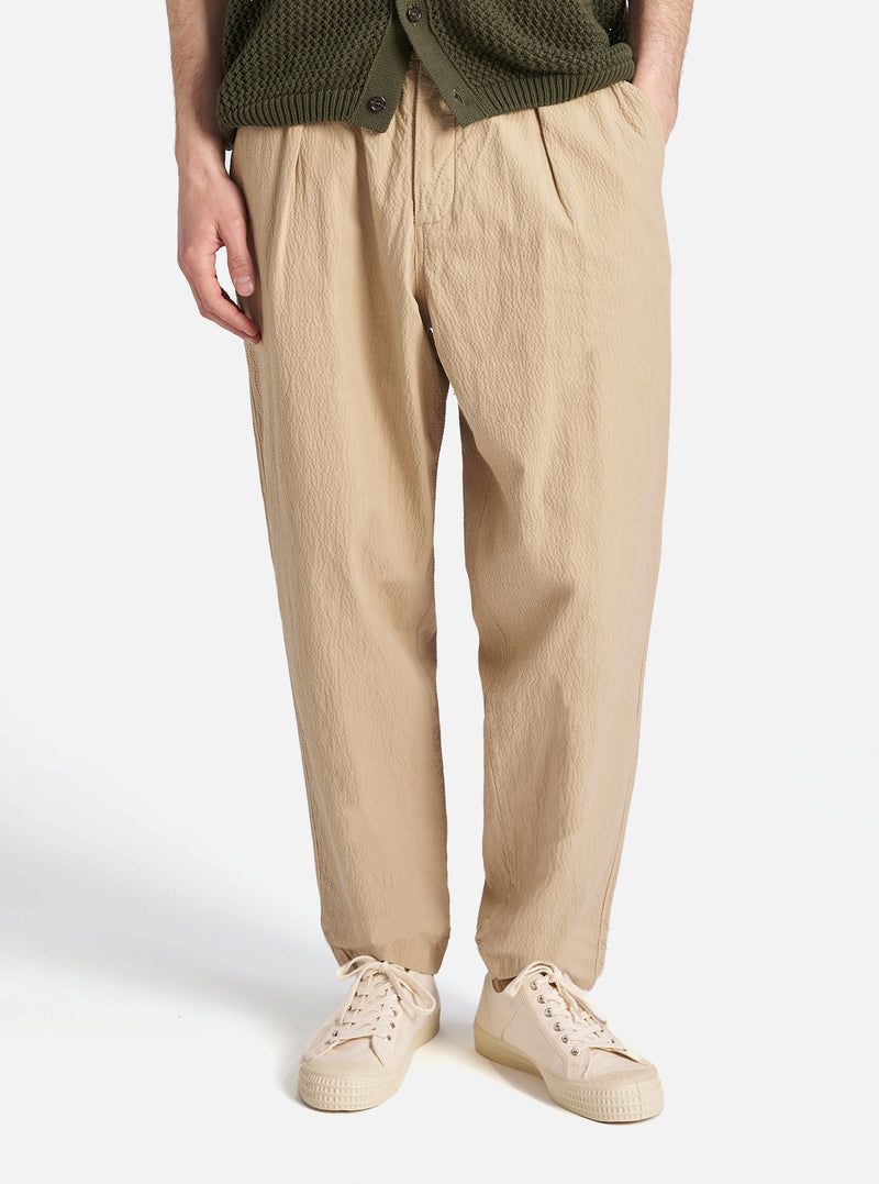 Universal Works Pleated Track Pant in Sand Seersucker II