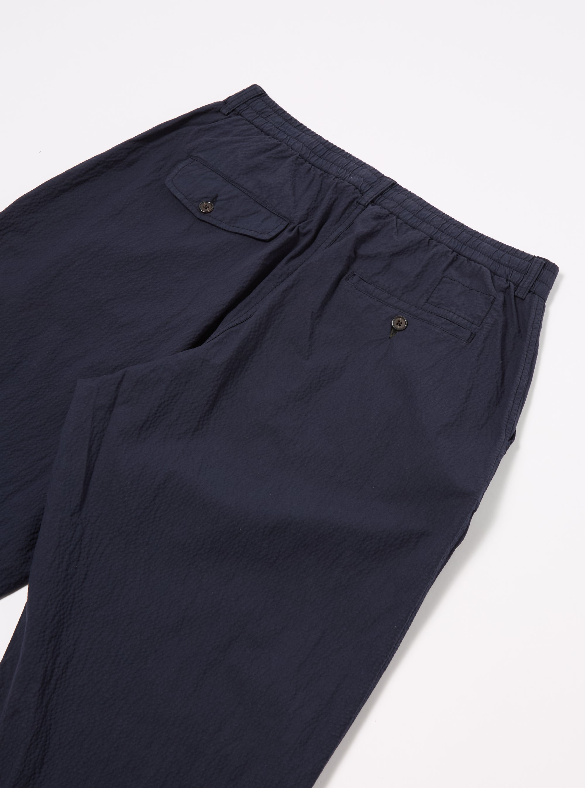 Universal Works Pleated Track Pant in Navy Seersucker II