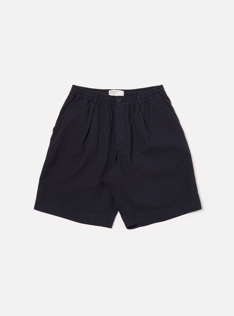 Universal Works Pleated Track Short in Navy Seersucker II