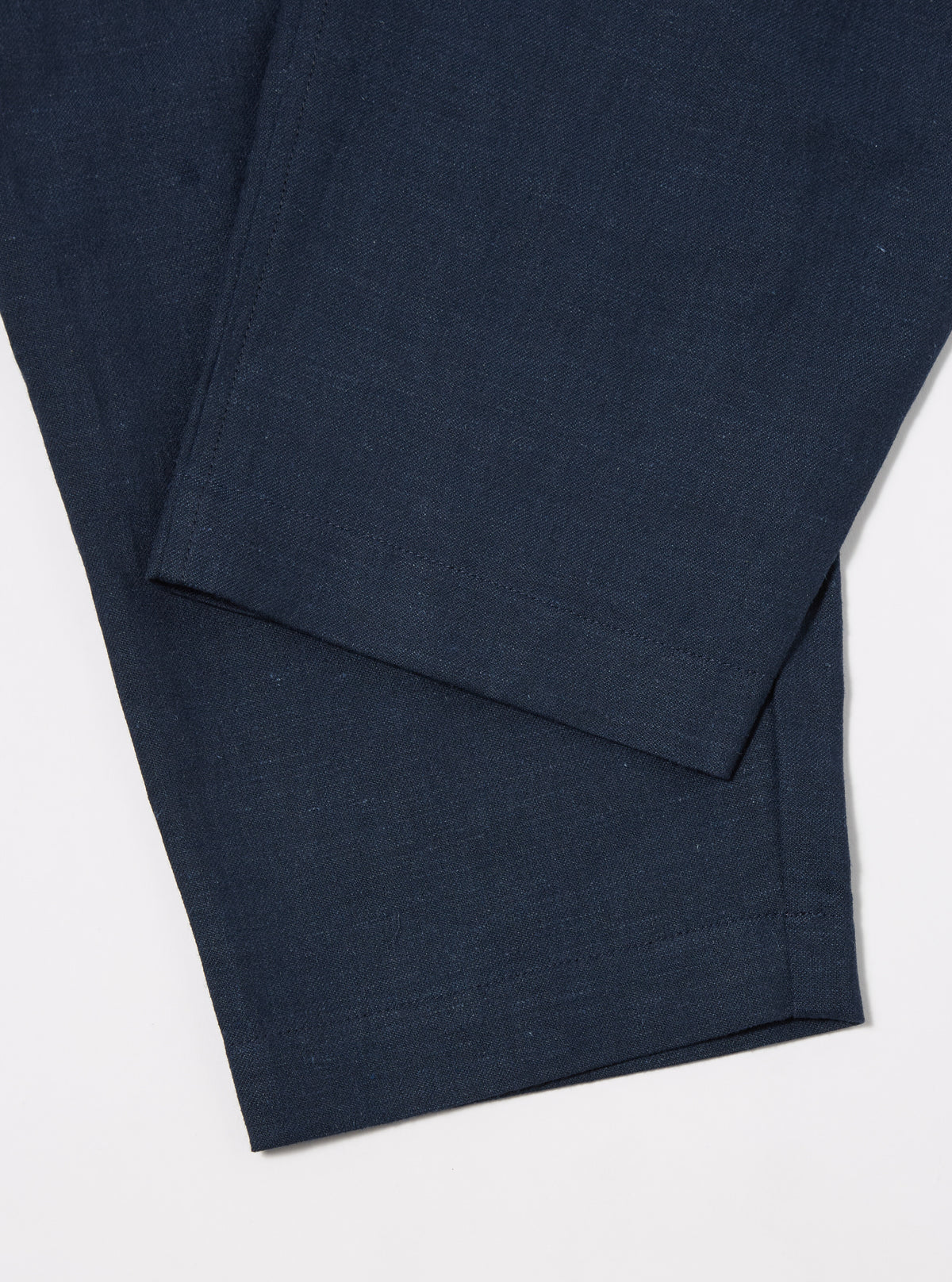 Universal Works Pleated Track Pant in Navy Lord Cotton Linen