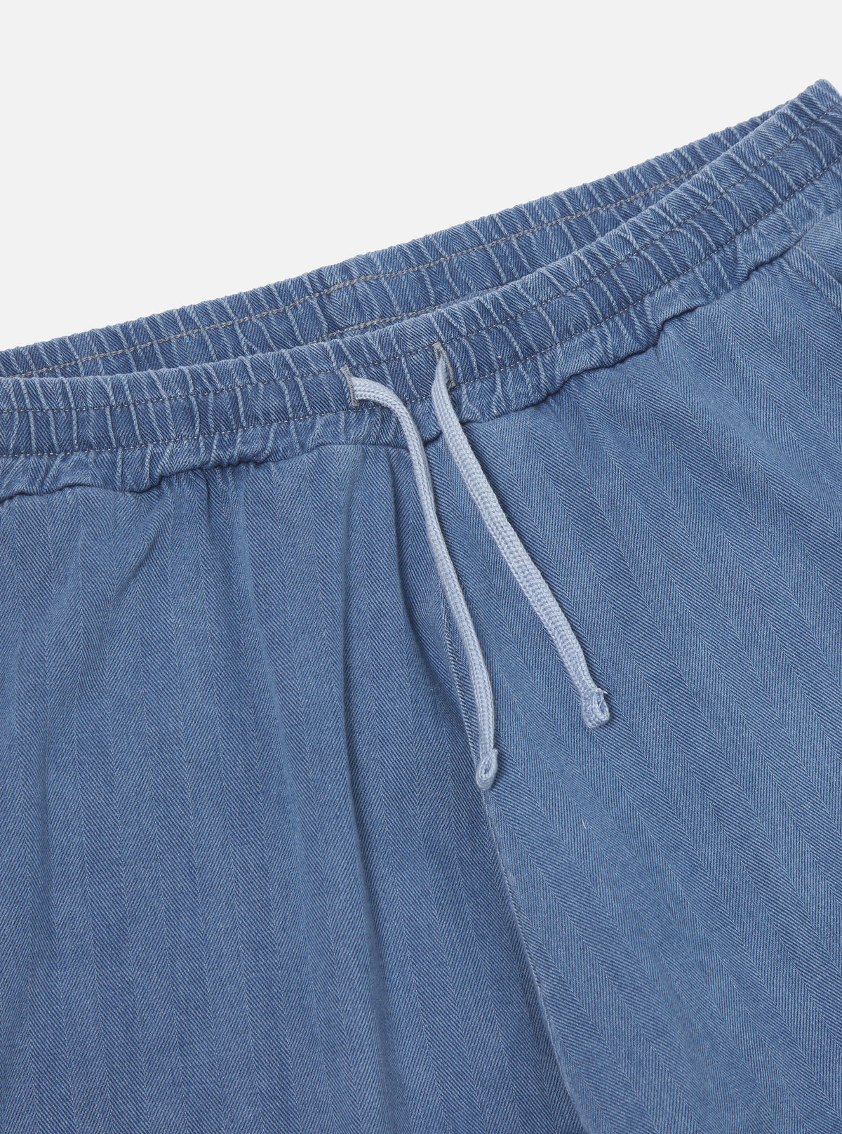 Universal Works Braga Pant in Washed Indigo Herringbone Denim