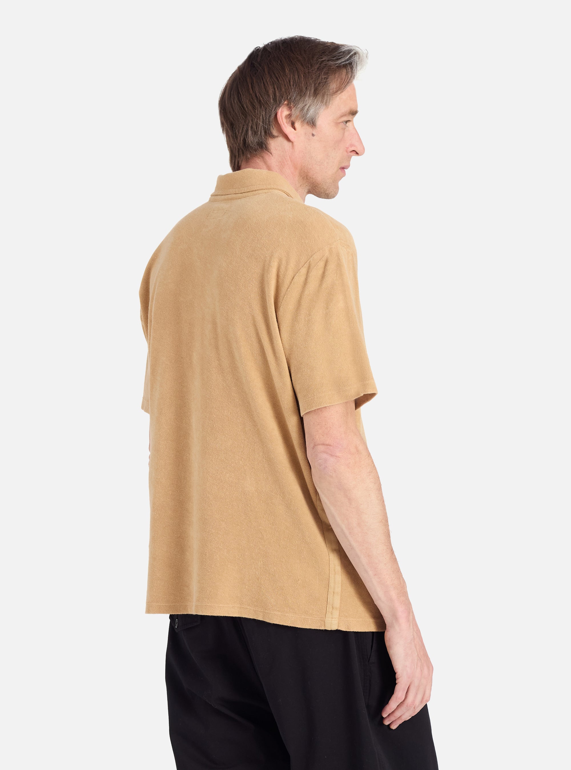 Universal Works Newlyn Polo in Sand Light Weight Terry