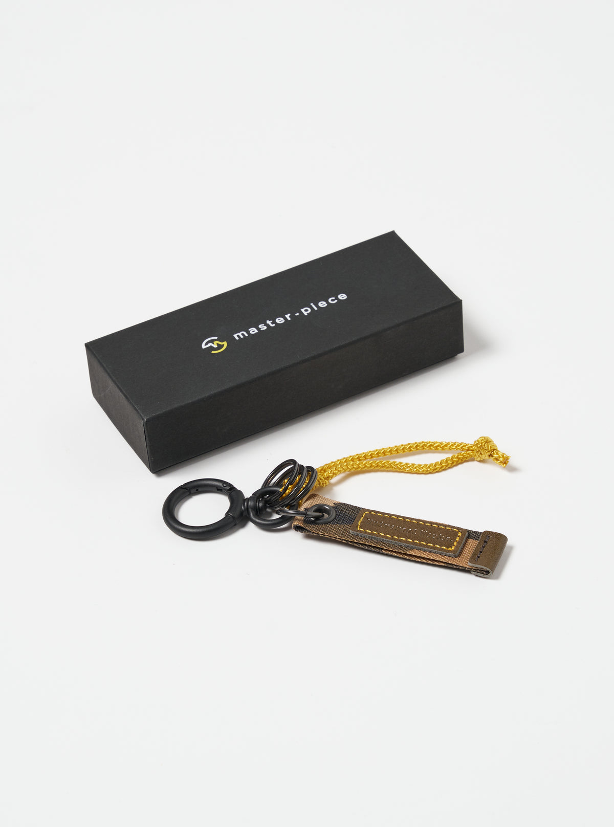 master-piece x Universal Works Keychain in Camo Recycled Tech Canvas