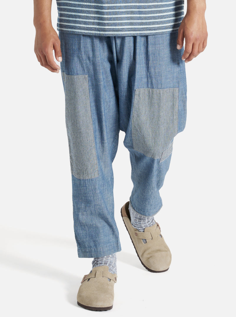 Universal Works Patched Pleated Track Pant in Indigo Chambray/Hickory Stripe Denim