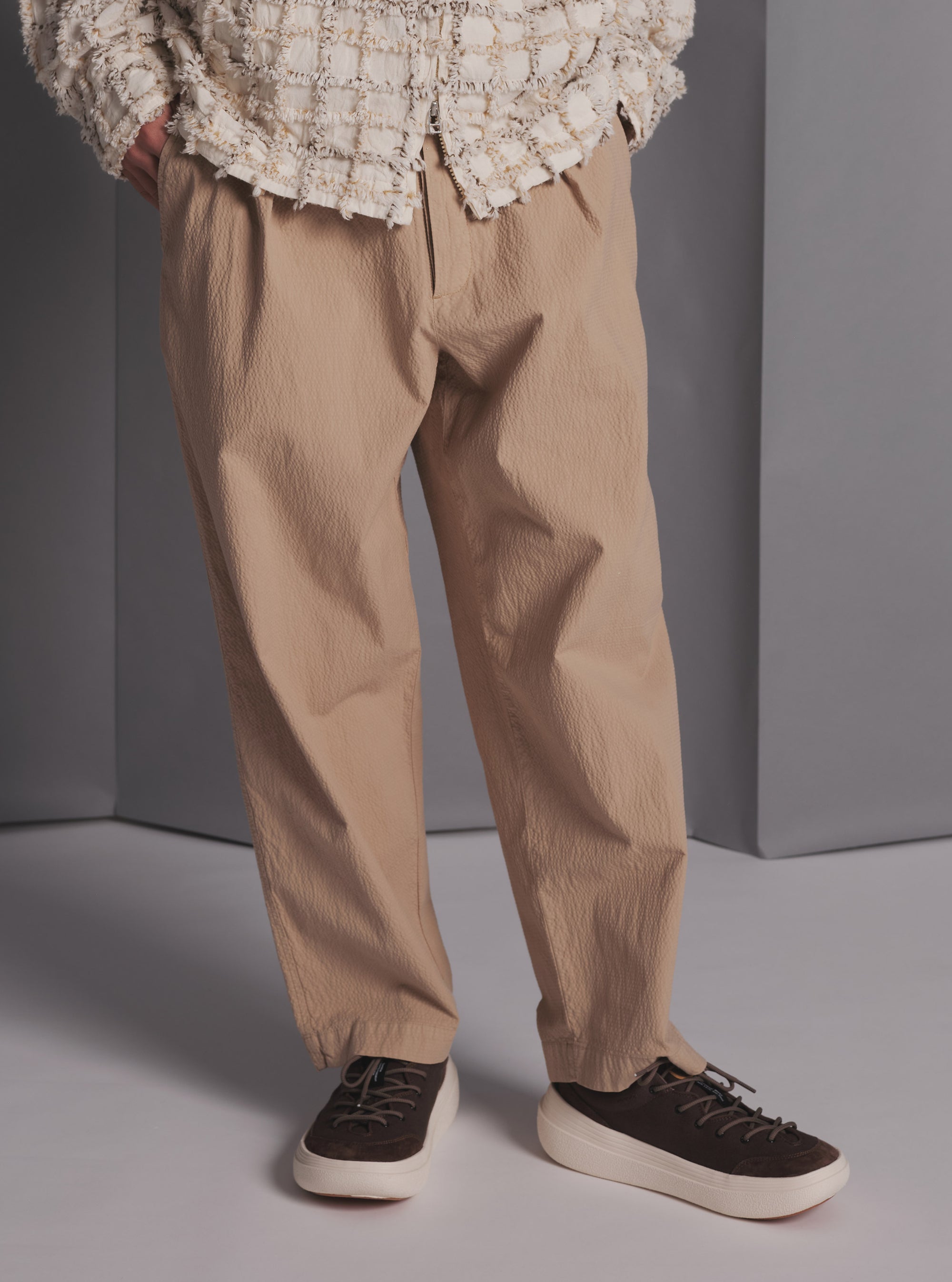 Universal Works Pleated Track Pant in Sand Seersucker II