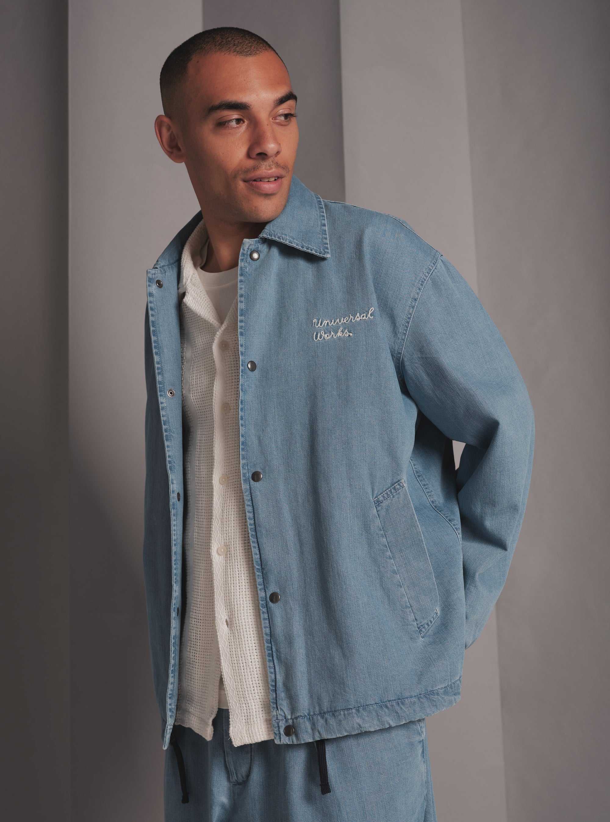 Universal Works Head Coach Jacket in Washed Indigo 8oz Organic Denim