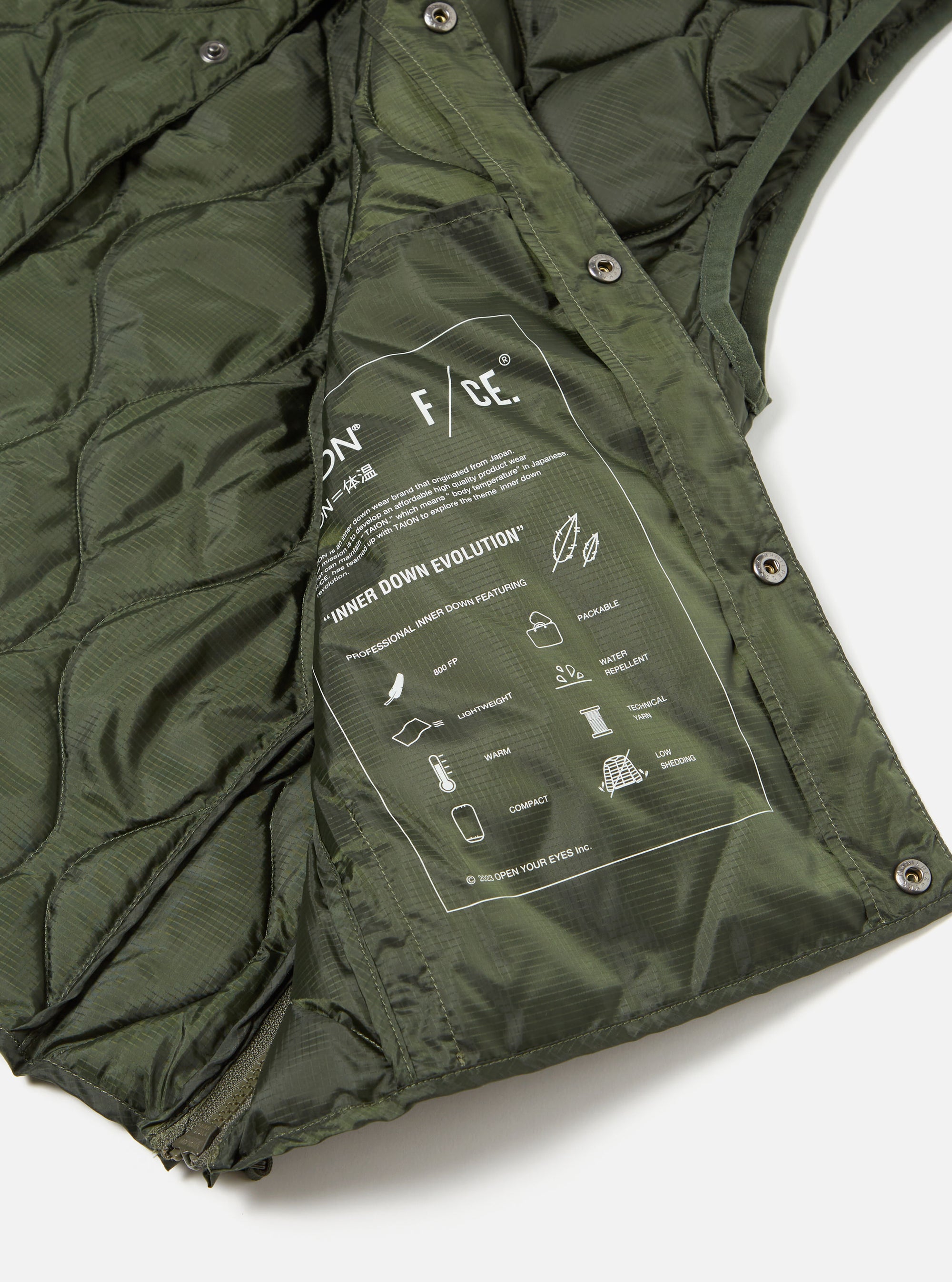 Taion by F/CE. Packable Down Vest in Olive Nylon Ripstop/Duck Down