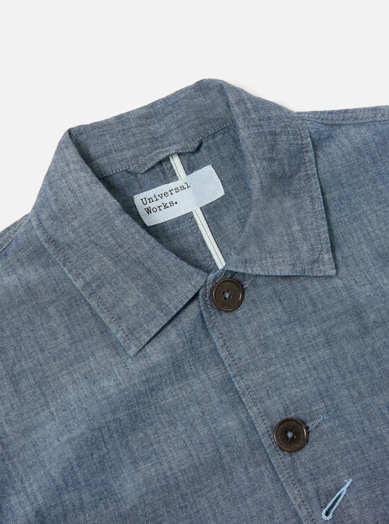 Universal Works Patched Bakers Jacket in Indigo Chambray Hickory