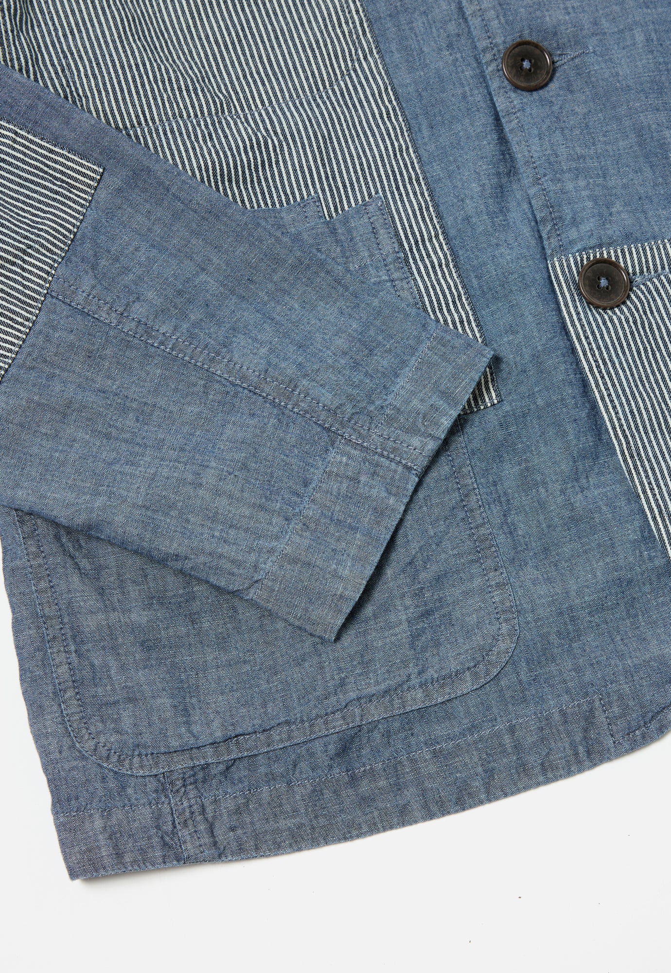 Universal Works Patched Bakers Jacket in Indigo Chambray Hickory