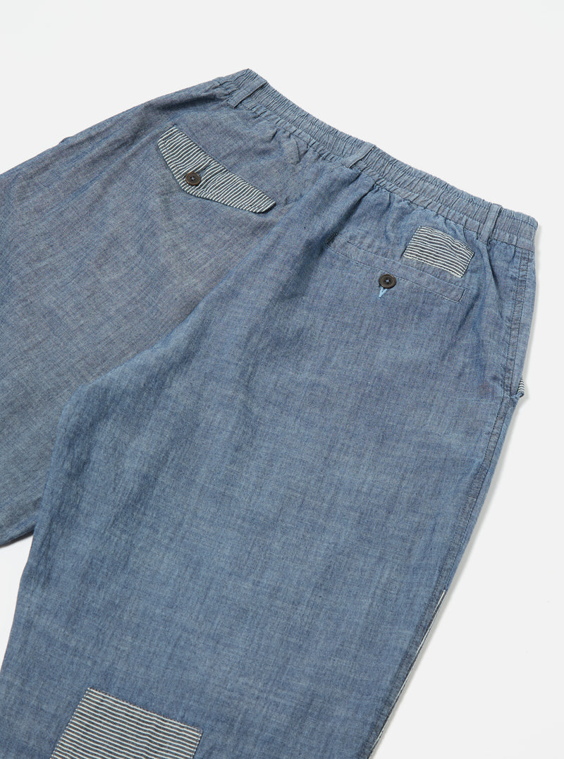 Universal Works Patched Pleated Track Pant in Indigo Chambray Hickory