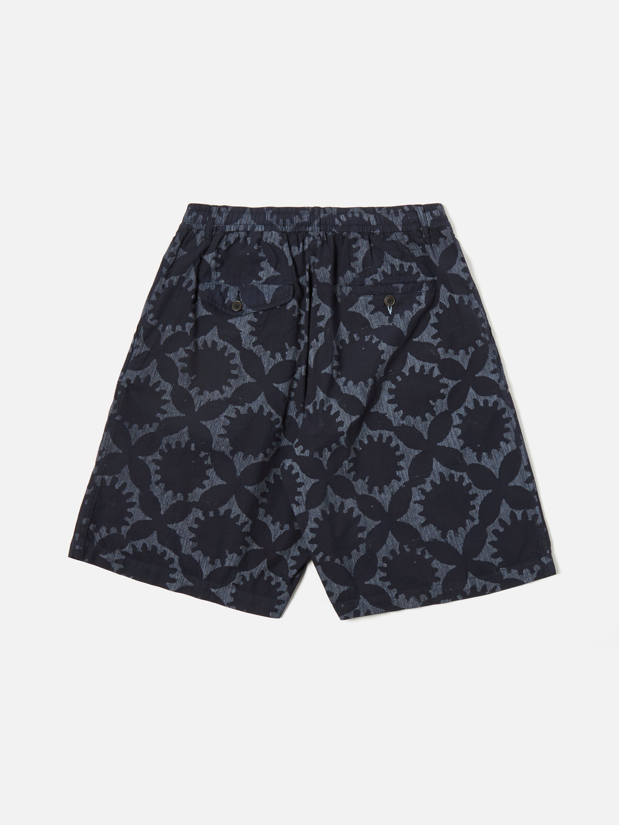 Universal Works Pleated Track Short in Navy Over Dyed Sun Print