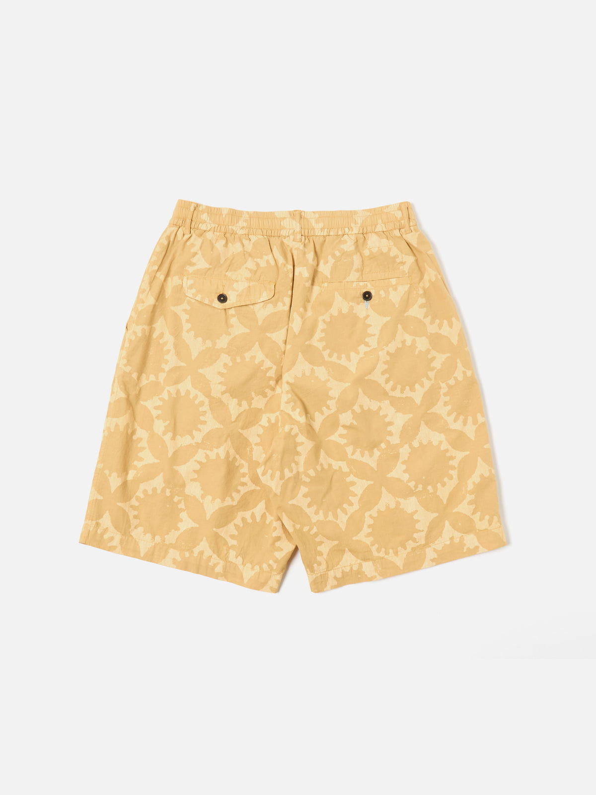 Universal Works Pleated Track Short in Sand Over Dyed Sun Print