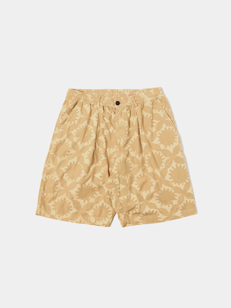 Universal Works Pleated Track Short in Sand Over Dyed Sun Print