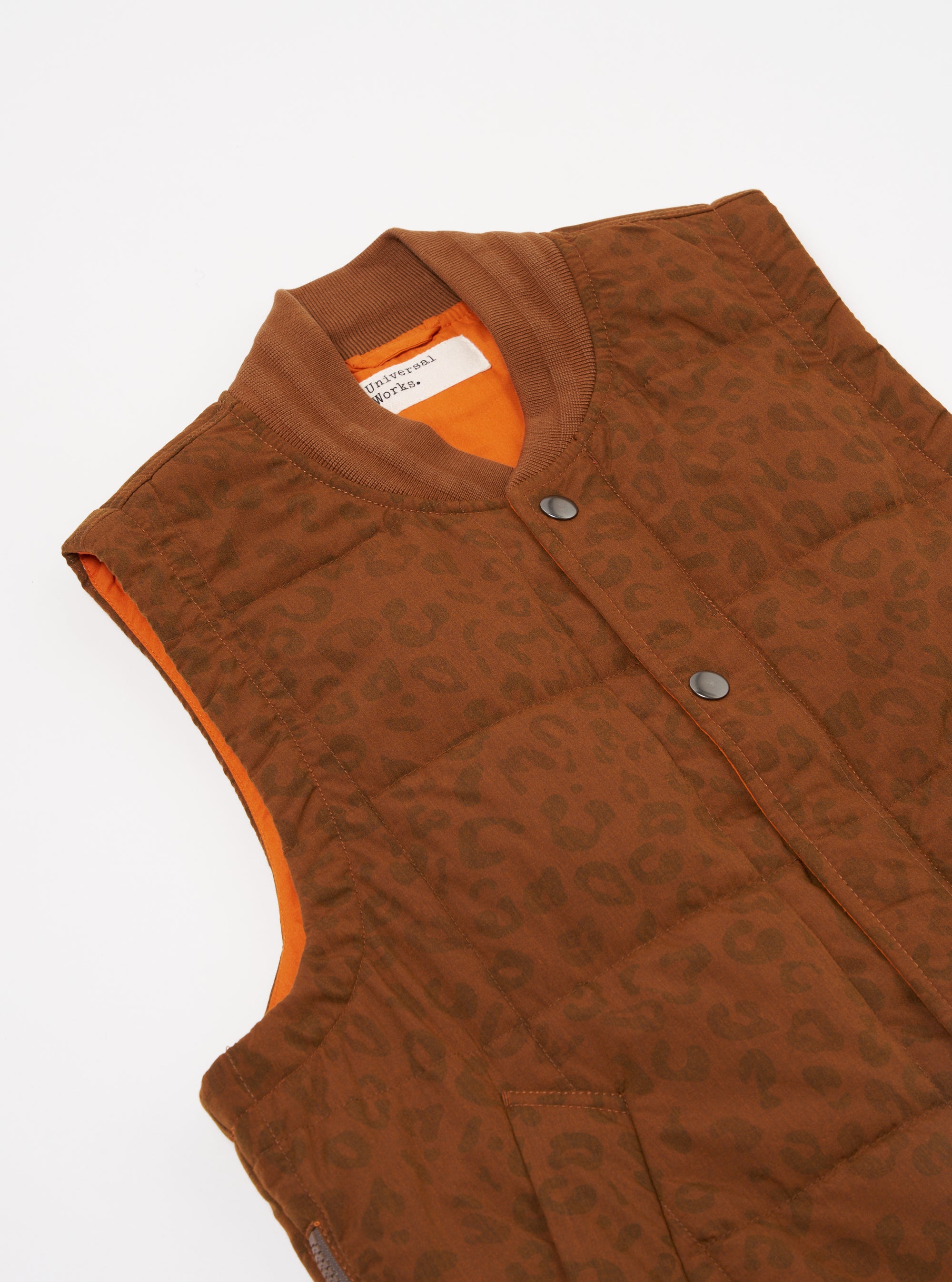 Universal Works Carlton Gilet in Orange Leopard Recycled Polytech